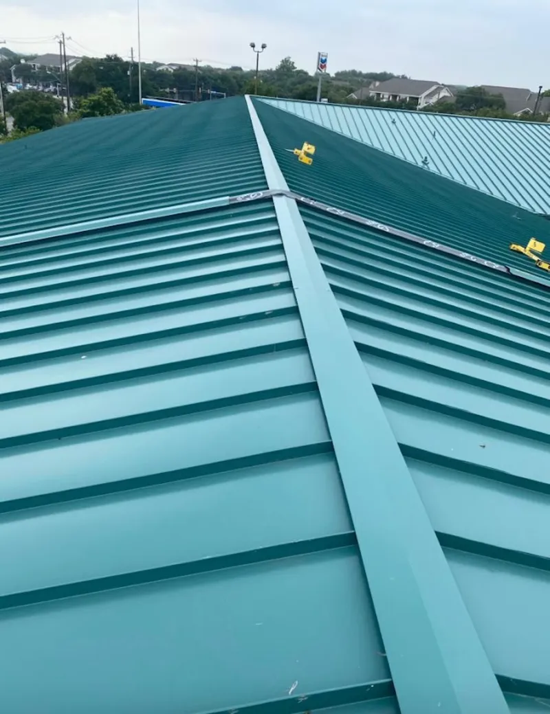 Green commercial metal roof ridge and valley for Metal Roof Repair in East Whittier